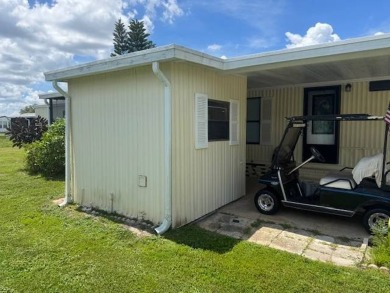 Welcome home to this lovely 2-bedroom, 2-bath oasis in the 55+ on Lake Henry Golf Club in Florida - for sale on GolfHomes.com, golf home, golf lot