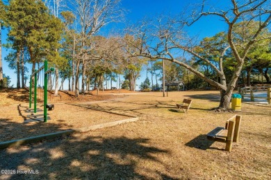 Experience the essence of coastal living in this well maintained on The Country Club of the Crystal Coast in North Carolina - for sale on GolfHomes.com, golf home, golf lot