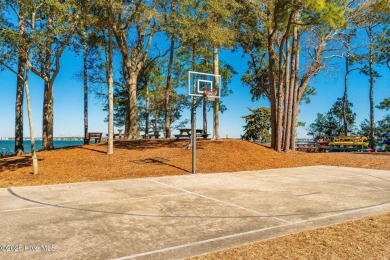 Experience the essence of coastal living in this well maintained on The Country Club of the Crystal Coast in North Carolina - for sale on GolfHomes.com, golf home, golf lot