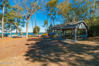 Experience the essence of coastal living in this well maintained on The Country Club of the Crystal Coast in North Carolina - for sale on GolfHomes.com, golf home, golf lot