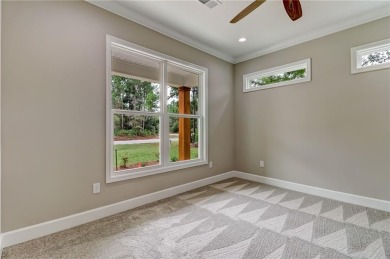This stunning two-story home by renowned local builder Josselyn on Laurel Island Links in Georgia - for sale on GolfHomes.com, golf home, golf lot