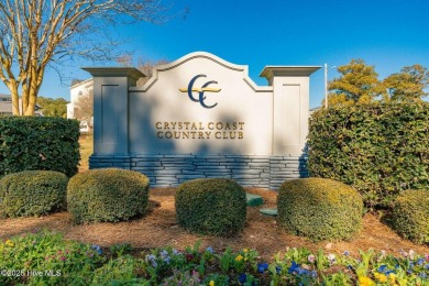 Experience the essence of coastal living in this well maintained on The Country Club of the Crystal Coast in North Carolina - for sale on GolfHomes.com, golf home, golf lot