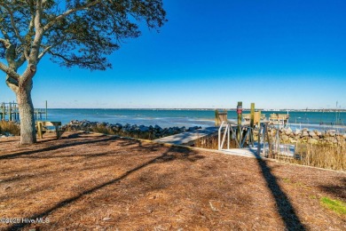 Experience the essence of coastal living in this well maintained on The Country Club of the Crystal Coast in North Carolina - for sale on GolfHomes.com, golf home, golf lot