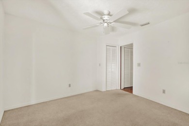 Under contract-accepting backup offers. Nature-Lover's Retreat on Carrollwood Country Club in Florida - for sale on GolfHomes.com, golf home, golf lot