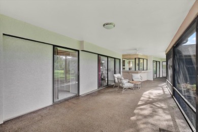 Under contract-accepting backup offers. Nature-Lover's Retreat on Carrollwood Country Club in Florida - for sale on GolfHomes.com, golf home, golf lot