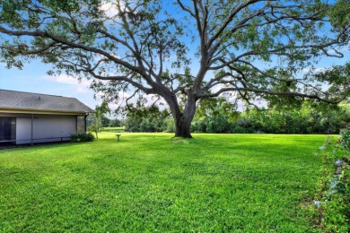 Under contract-accepting backup offers. Nature-Lover's Retreat on Carrollwood Country Club in Florida - for sale on GolfHomes.com, golf home, golf lot