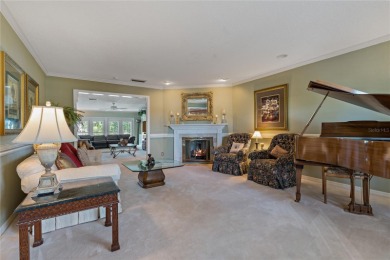 Step into timeless elegance in this stunning Colonial-style on Feather Sound Country Club in Florida - for sale on GolfHomes.com, golf home, golf lot