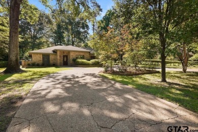 Nestled among mature trees, this charming 3 bedroom, 2 bath home on Hide-A-Way Lake Golf Course in Texas - for sale on GolfHomes.com, golf home, golf lot