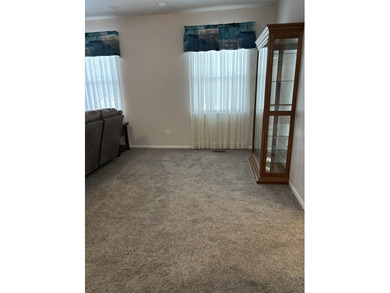 Prepare to fall in love! This well-kept ranch townhome located on Carillon Lakes 3 Hole Course in Illinois - for sale on GolfHomes.com, golf home, golf lot