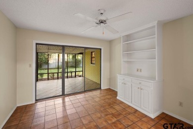 Nestled among mature trees, this charming 3 bedroom, 2 bath home on Hide-A-Way Lake Golf Course in Texas - for sale on GolfHomes.com, golf home, golf lot