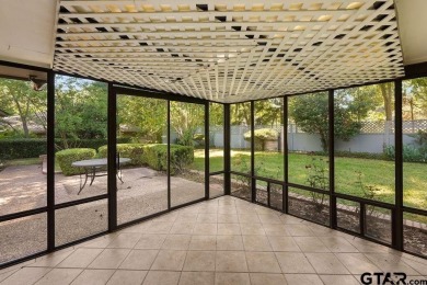 Nestled among mature trees, this charming 3 bedroom, 2 bath home on Hide-A-Way Lake Golf Course in Texas - for sale on GolfHomes.com, golf home, golf lot