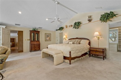 Step into timeless elegance in this stunning Colonial-style on Feather Sound Country Club in Florida - for sale on GolfHomes.com, golf home, golf lot