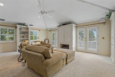 Step into timeless elegance in this stunning Colonial-style on Feather Sound Country Club in Florida - for sale on GolfHomes.com, golf home, golf lot