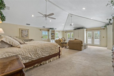 Step into timeless elegance in this stunning Colonial-style on Feather Sound Country Club in Florida - for sale on GolfHomes.com, golf home, golf lot