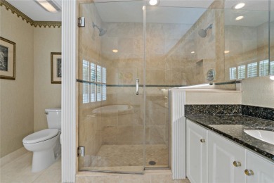 Step into timeless elegance in this stunning Colonial-style on Feather Sound Country Club in Florida - for sale on GolfHomes.com, golf home, golf lot