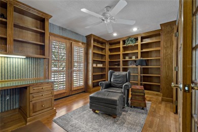 Step into timeless elegance in this stunning Colonial-style on Feather Sound Country Club in Florida - for sale on GolfHomes.com, golf home, golf lot