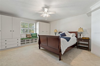 Step into timeless elegance in this stunning Colonial-style on Feather Sound Country Club in Florida - for sale on GolfHomes.com, golf home, golf lot