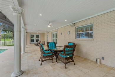 Step into timeless elegance in this stunning Colonial-style on Feather Sound Country Club in Florida - for sale on GolfHomes.com, golf home, golf lot