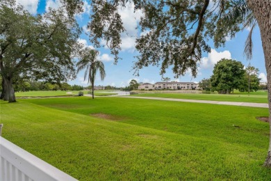 Step into timeless elegance in this stunning Colonial-style on Feather Sound Country Club in Florida - for sale on GolfHomes.com, golf home, golf lot