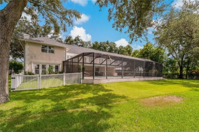 Step into timeless elegance in this stunning Colonial-style on Feather Sound Country Club in Florida - for sale on GolfHomes.com, golf home, golf lot