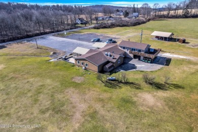 This spectacular property situated on 86 acres features a 9 hole on Morgan Hills in Pennsylvania - for sale on GolfHomes.com, golf home, golf lot