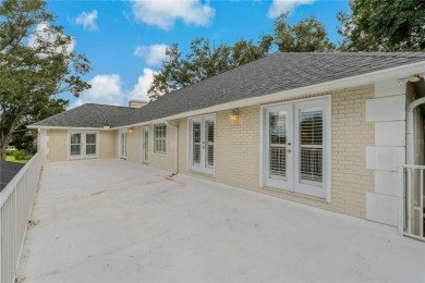 Step into timeless elegance in this stunning Colonial-style on Feather Sound Country Club in Florida - for sale on GolfHomes.com, golf home, golf lot