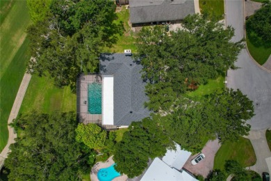 Step into timeless elegance in this stunning Colonial-style on Feather Sound Country Club in Florida - for sale on GolfHomes.com, golf home, golf lot