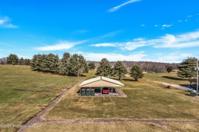 This spectacular property situated on 86 acres features a 9 hole on Morgan Hills in Pennsylvania - for sale on GolfHomes.com, golf home, golf lot