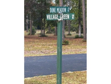 This .61 acre lot in gated Coopers Point is located on a private on Sapelo Hammock Golf Club in Georgia - for sale on GolfHomes.com, golf home, golf lot