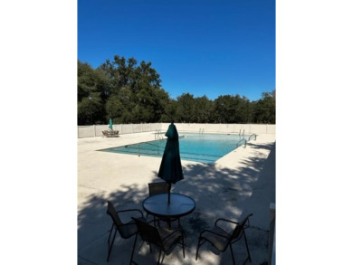 This .61 acre lot in gated Coopers Point is located on a private on Sapelo Hammock Golf Club in Georgia - for sale on GolfHomes.com, golf home, golf lot