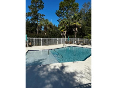 This .61 acre lot in gated Coopers Point is located on a private on Sapelo Hammock Golf Club in Georgia - for sale on GolfHomes.com, golf home, golf lot