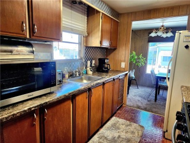 Welcome home to one of Long Beach's highly sought after senior on Bixby Village Golf Course in California - for sale on GolfHomes.com, golf home, golf lot