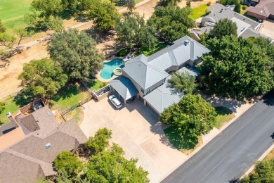 Welcome to 54 Pinehurst, an elegant 4,177 sq. ft. home located on Abilene Country Club - South Course in Texas - for sale on GolfHomes.com, golf home, golf lot