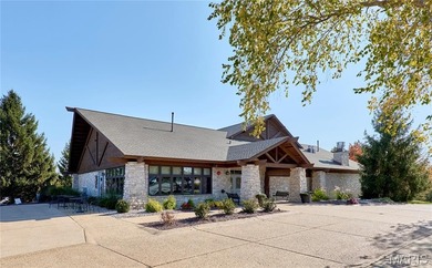 Poised on a premium lot backing to the 5th green of Bear Creek on Bear Creek Golf Club in Missouri - for sale on GolfHomes.com, golf home, golf lot