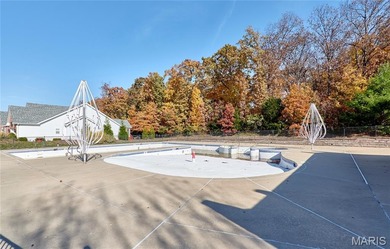 Poised on a premium lot backing to the 5th green of Bear Creek on Bear Creek Golf Club in Missouri - for sale on GolfHomes.com, golf home, golf lot