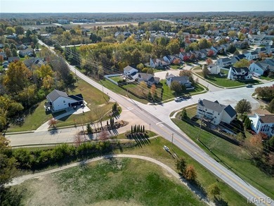 Poised on a premium lot backing to the 5th green of Bear Creek on Bear Creek Golf Club in Missouri - for sale on GolfHomes.com, golf home, golf lot