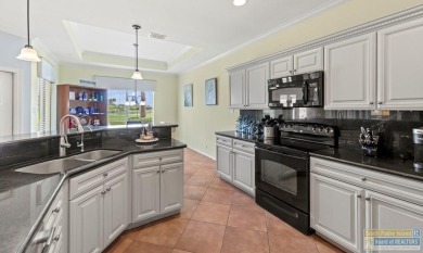 Enjoy lake views and fairway living at 13 Hacienda Dr. This on South Padre Island Golf Club in Texas - for sale on GolfHomes.com, golf home, golf lot