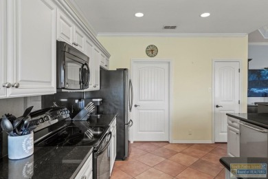 Enjoy lake views and fairway living at 13 Hacienda Dr. This on South Padre Island Golf Club in Texas - for sale on GolfHomes.com, golf home, golf lot