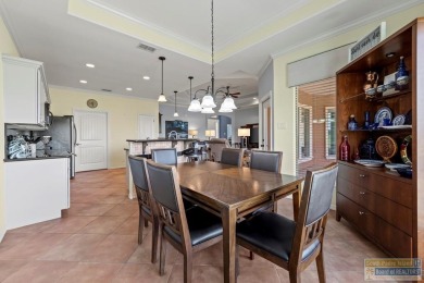 Enjoy lake views and fairway living at 13 Hacienda Dr. This on South Padre Island Golf Club in Texas - for sale on GolfHomes.com, golf home, golf lot