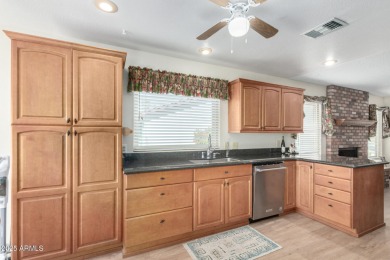 Welcome to your playful paradise! This 3-bedroom charmer with a on Arizona Golf Resort and Conference Center in Arizona - for sale on GolfHomes.com, golf home, golf lot