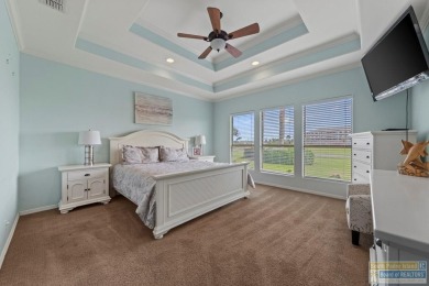Enjoy lake views and fairway living at 13 Hacienda Dr. This on South Padre Island Golf Club in Texas - for sale on GolfHomes.com, golf home, golf lot