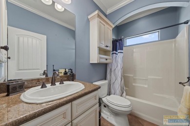 Enjoy lake views and fairway living at 13 Hacienda Dr. This on South Padre Island Golf Club in Texas - for sale on GolfHomes.com, golf home, golf lot