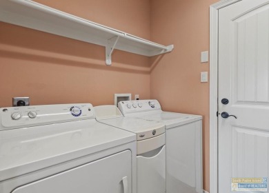 Enjoy lake views and fairway living at 13 Hacienda Dr. This on South Padre Island Golf Club in Texas - for sale on GolfHomes.com, golf home, golf lot