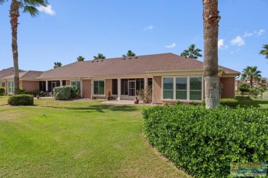 Enjoy lake views and fairway living at 13 Hacienda Dr. This on South Padre Island Golf Club in Texas - for sale on GolfHomes.com, golf home, golf lot