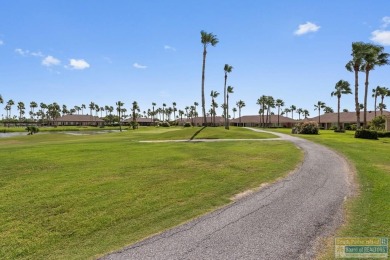 Enjoy lake views and fairway living at 13 Hacienda Dr. This on South Padre Island Golf Club in Texas - for sale on GolfHomes.com, golf home, golf lot