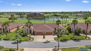 Enjoy lake views and fairway living at 13 Hacienda Dr. This on South Padre Island Golf Club in Texas - for sale on GolfHomes.com, golf home, golf lot