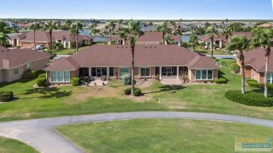 Enjoy lake views and fairway living at 13 Hacienda Dr. This on South Padre Island Golf Club in Texas - for sale on GolfHomes.com, golf home, golf lot