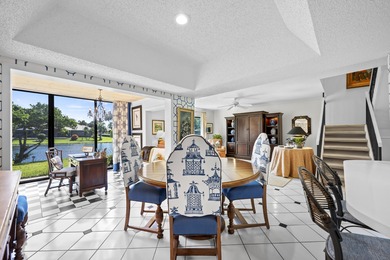 Spacious lakefront golf villa with 3 bedrooms, 2.5 bathrooms on Mariner Sands Country Club in Florida - for sale on GolfHomes.com, golf home, golf lot