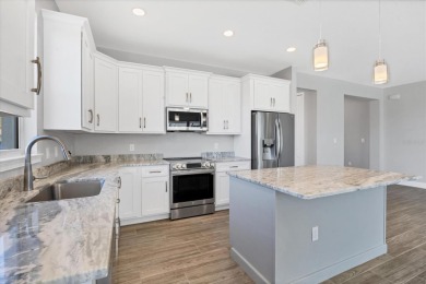 Step into this beautiful never-lived-in home, perfectly situated on Rotonda Golf and Country Club The Palms Course in Florida - for sale on GolfHomes.com, golf home, golf lot
