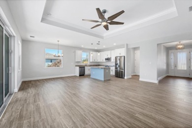 Step into this beautiful never-lived-in home, perfectly situated on Rotonda Golf and Country Club The Palms Course in Florida - for sale on GolfHomes.com, golf home, golf lot